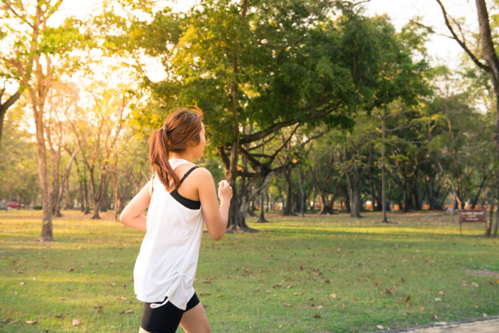 a woman jogging on the jogging track